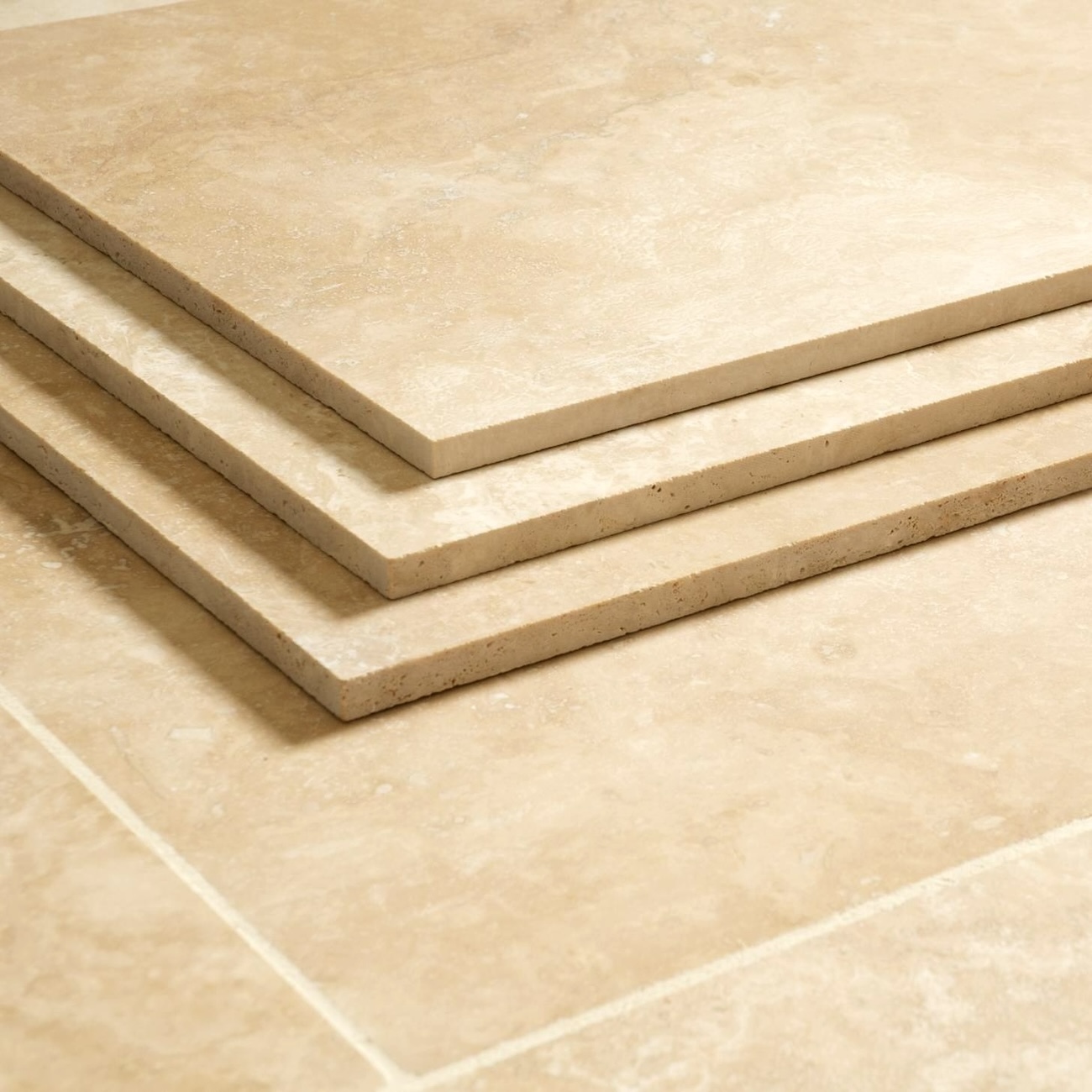 IVORY LIGHT TRAVERTINE HONED 610X610X12